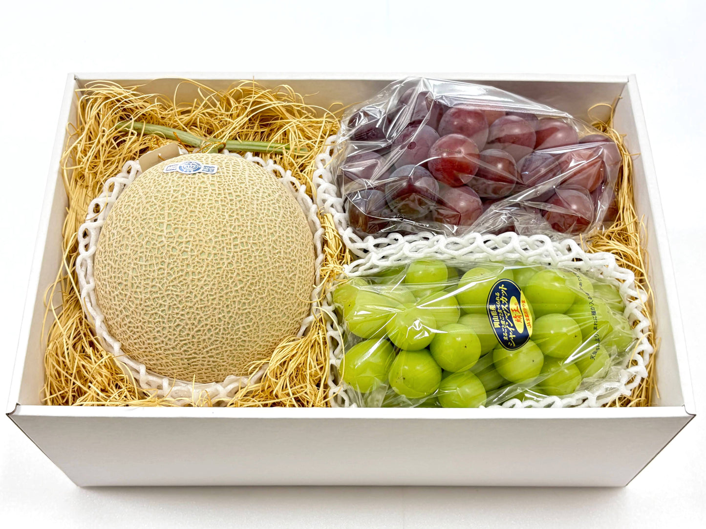 箱入りのクラウンメロンとぶどうセット